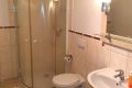 Badezimmer Apartment 1