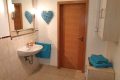 Badezimmer Apartment 1